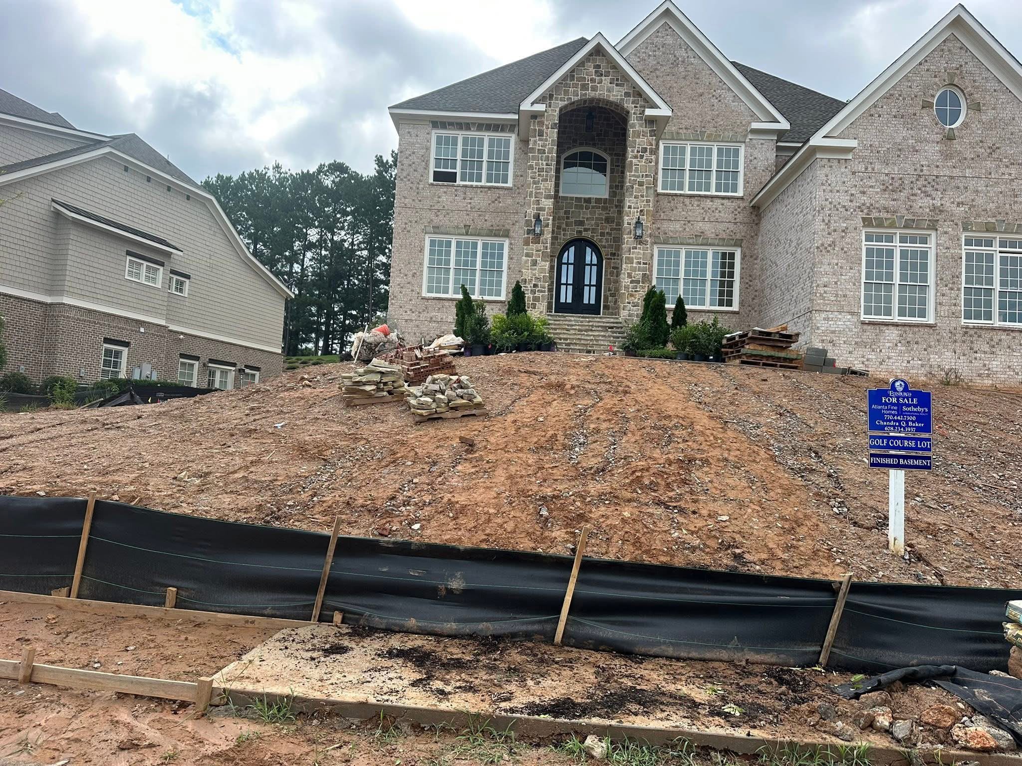 Before: bare dirt yard on a sloped estate in Metro Atlanta